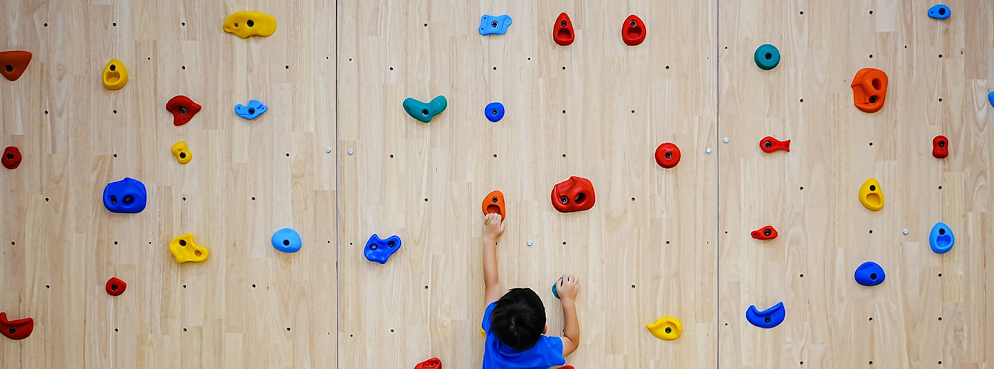 Kid rock climbing